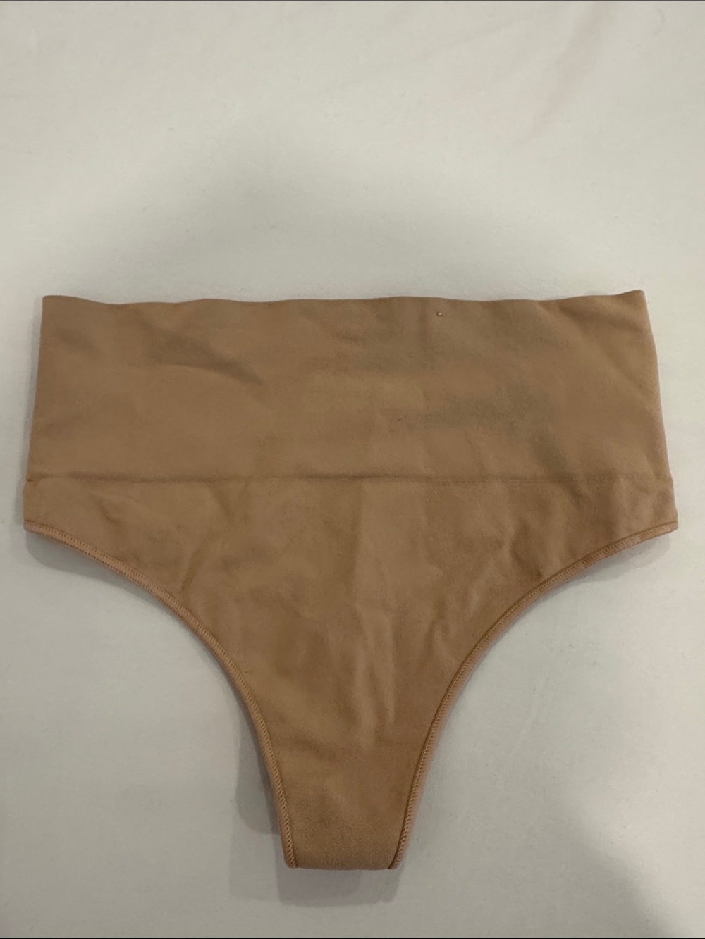 SPANX High-Waist thong Bottoms in light tan, used but in great condition. Small
